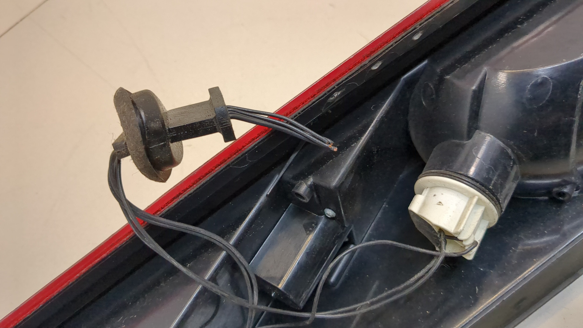 Фонарь задний левый