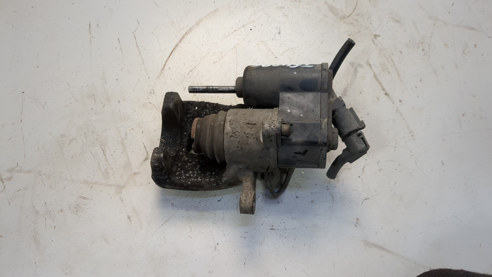 Суппорт задний левый