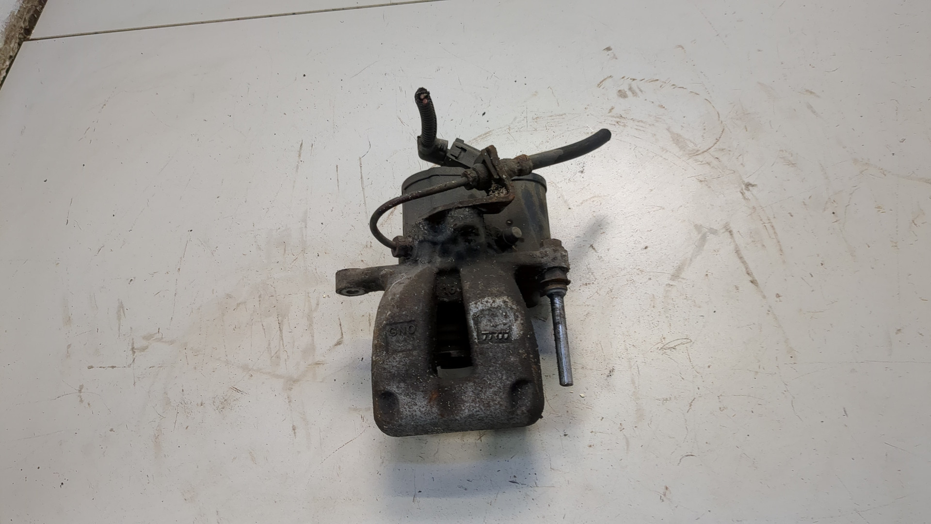 Суппорт задний левый