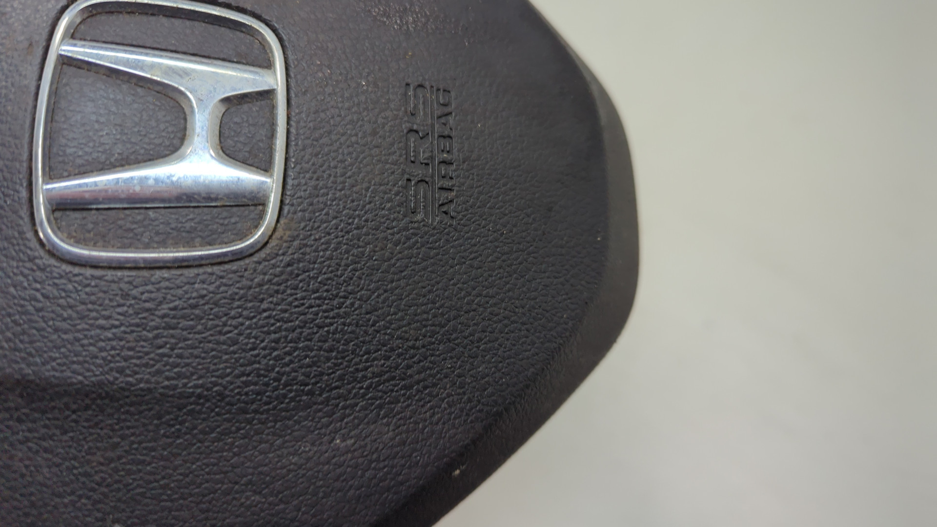 Подушка безопасности в рулевое колесо