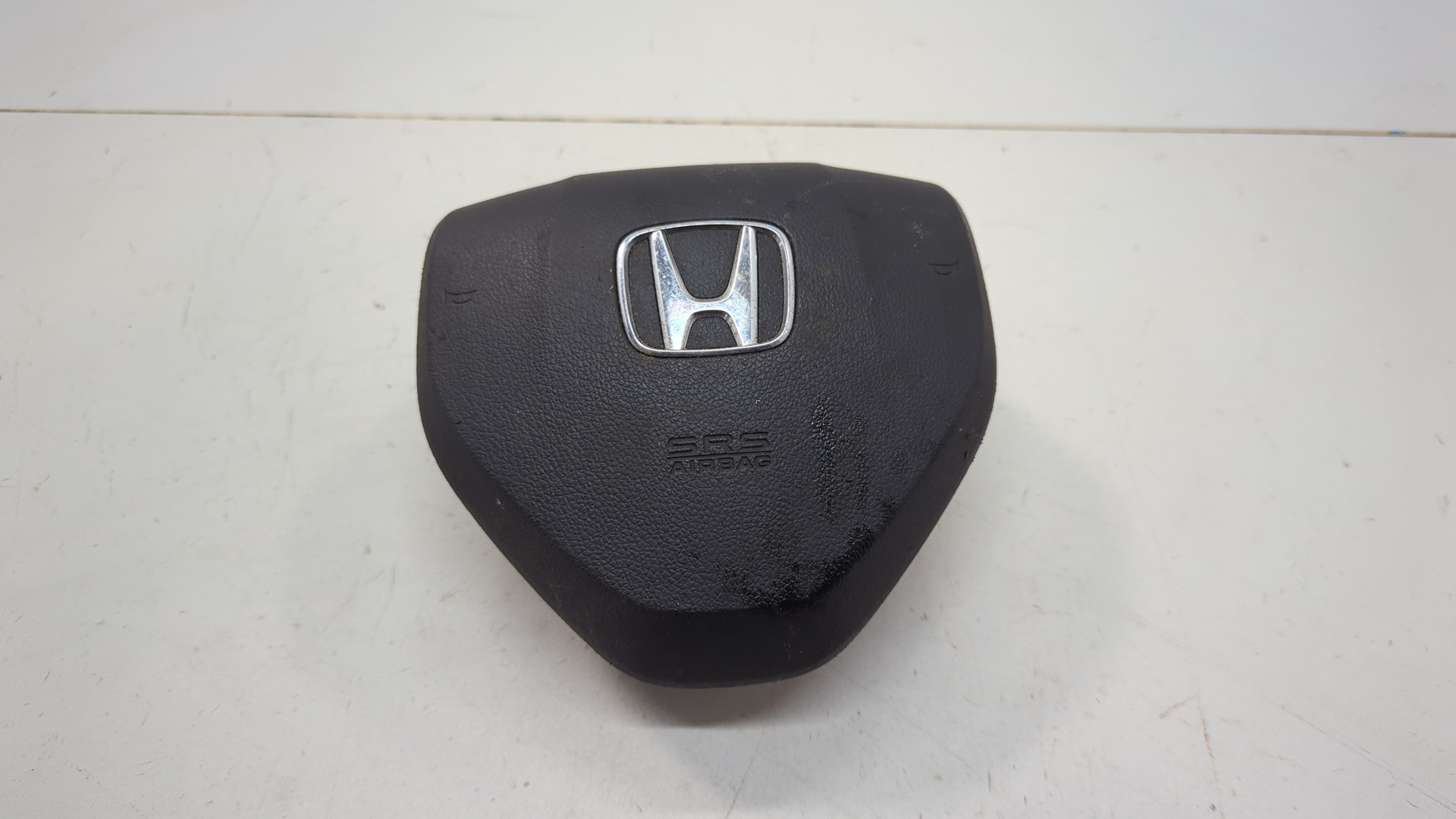 Подушка безопасности в рулевое колесо