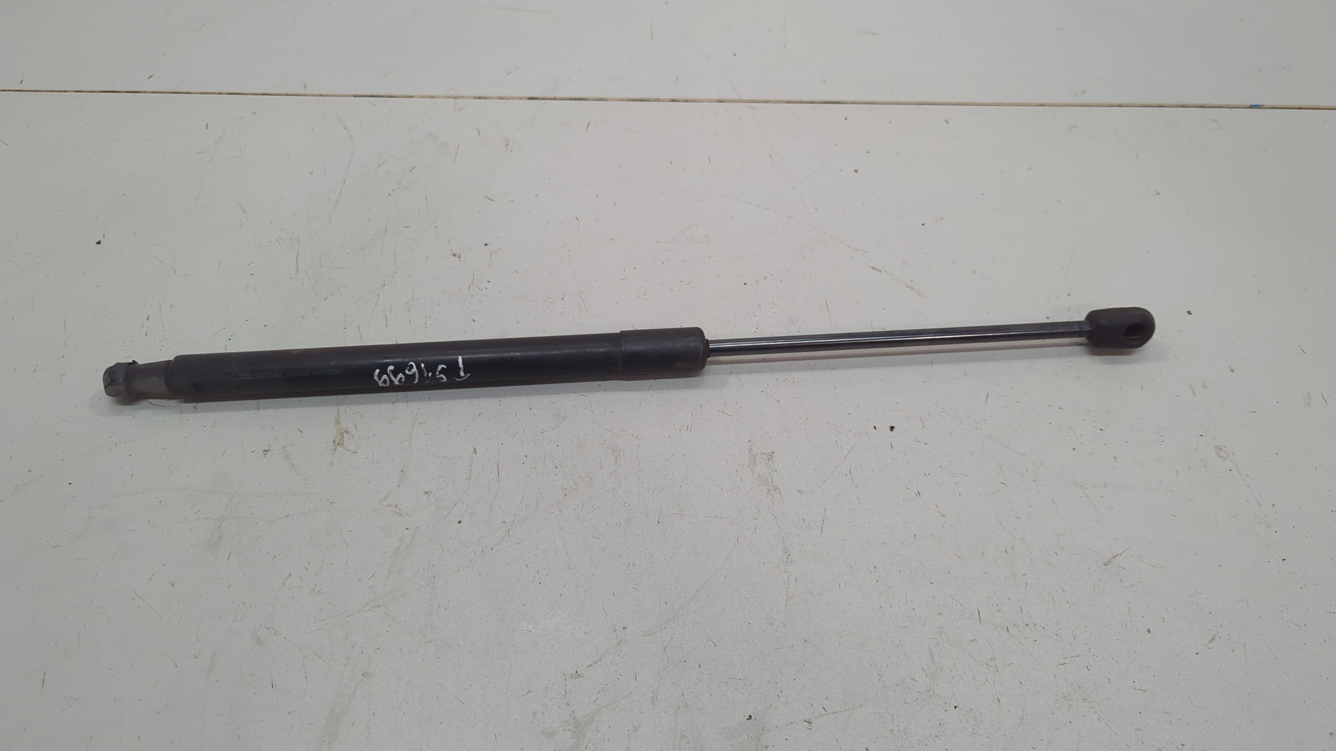 Амортизатор капота