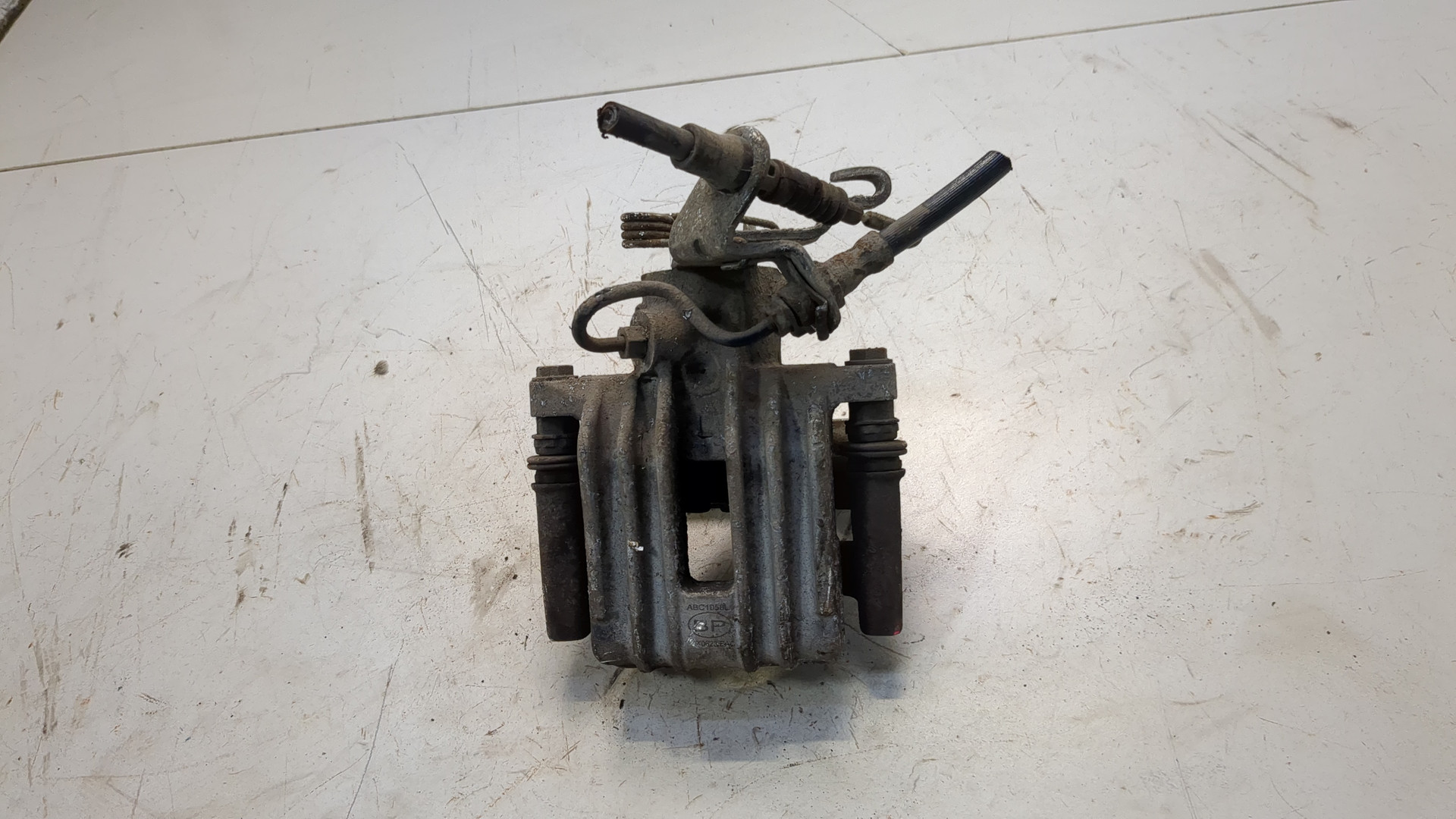 Суппорт задний левый