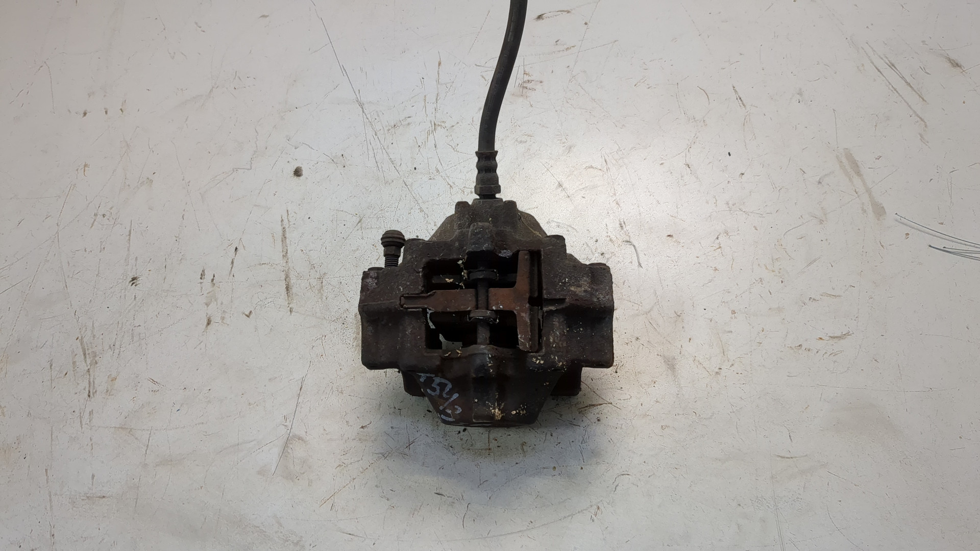 Суппорт задний левый