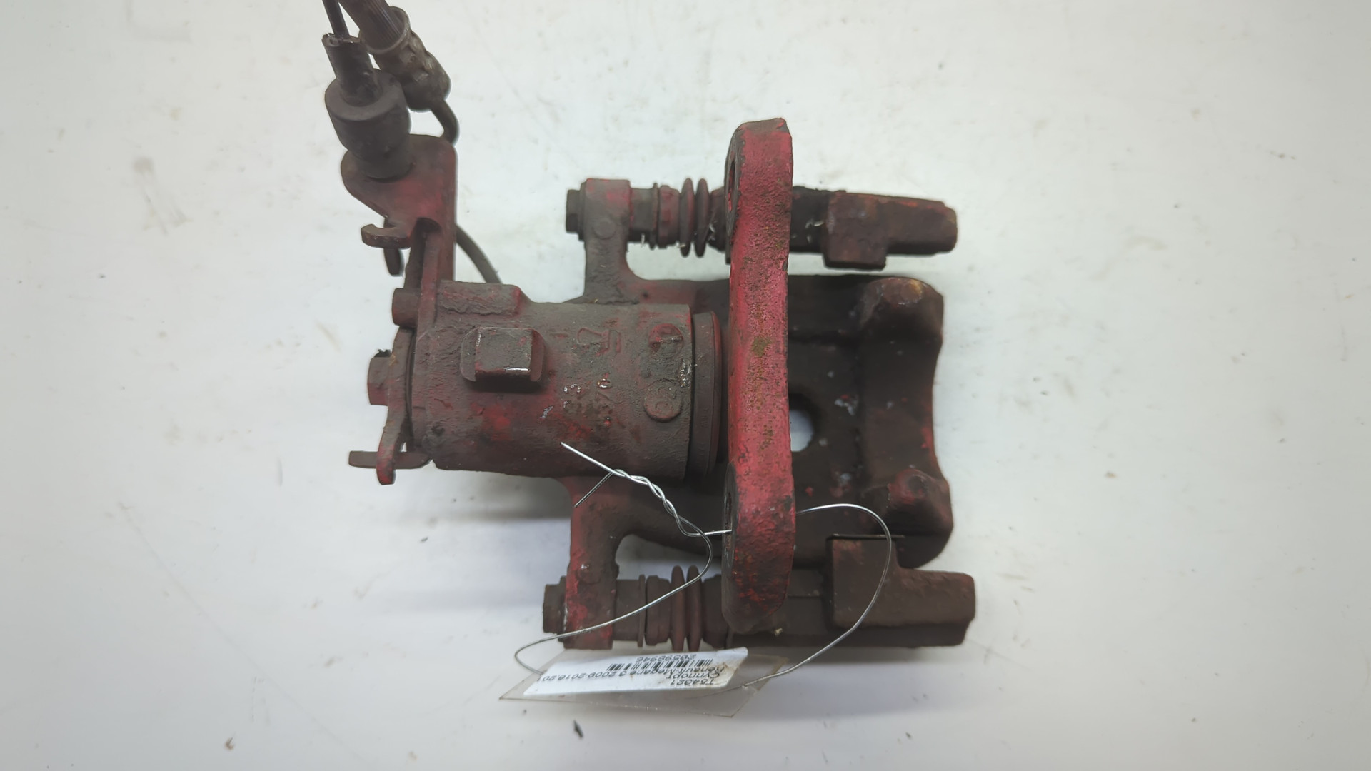 Суппорт задний левый