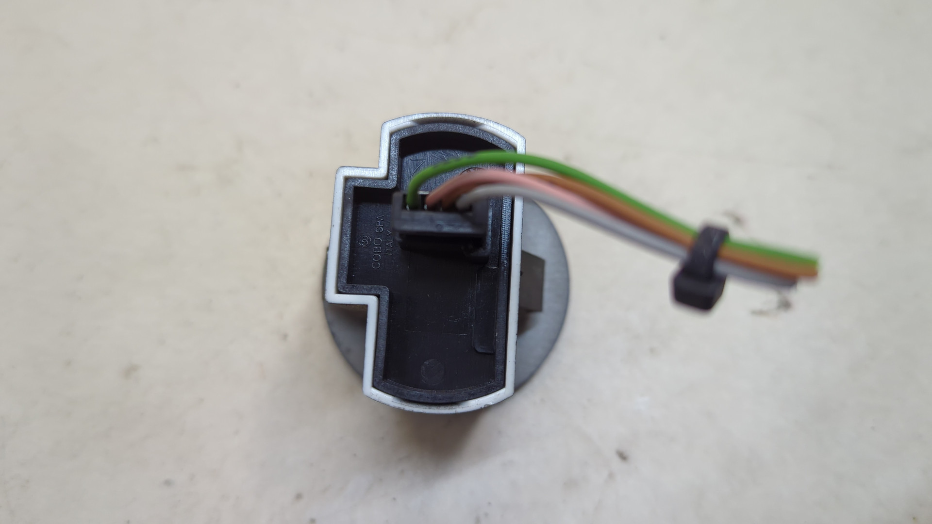 Кнопка корректора фар