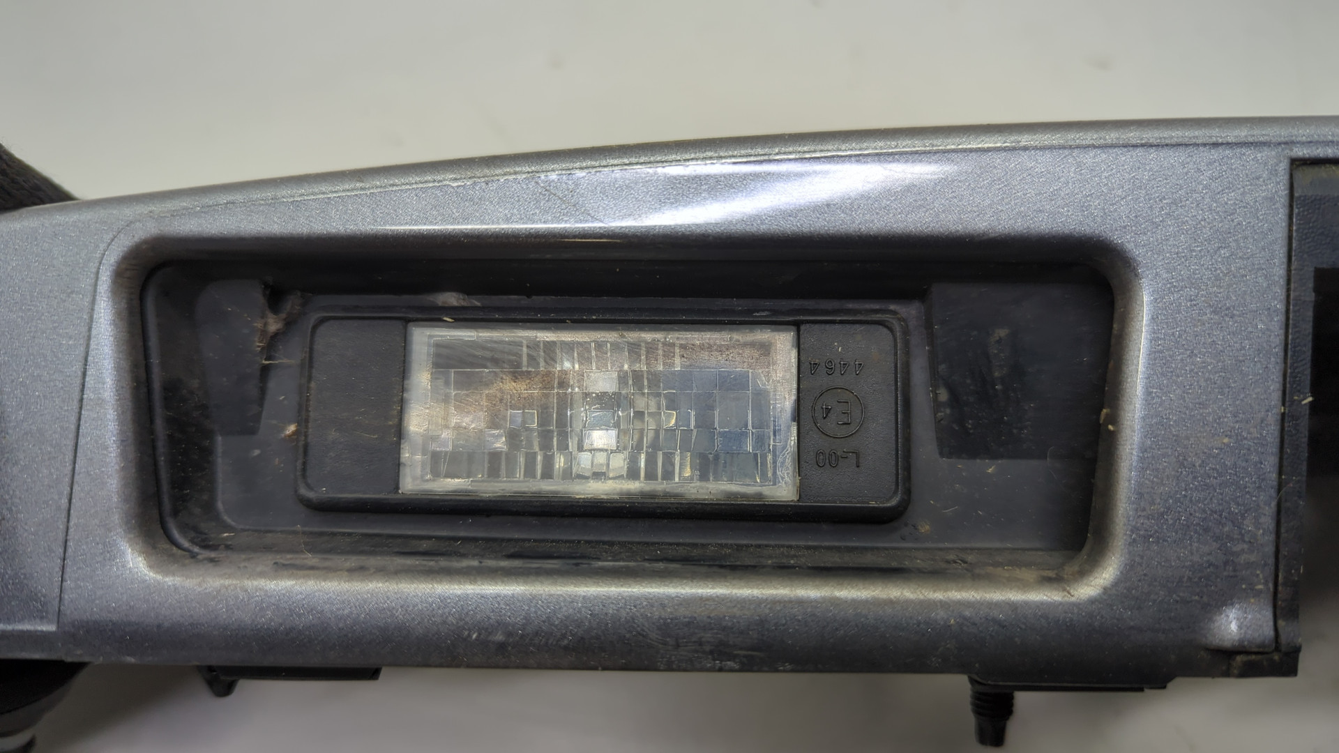 Фонарь подсветки номера