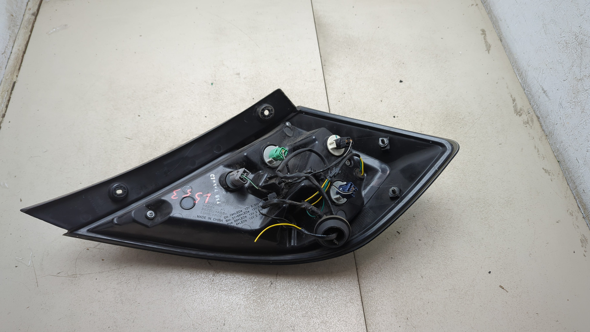 Фонарь задний левый