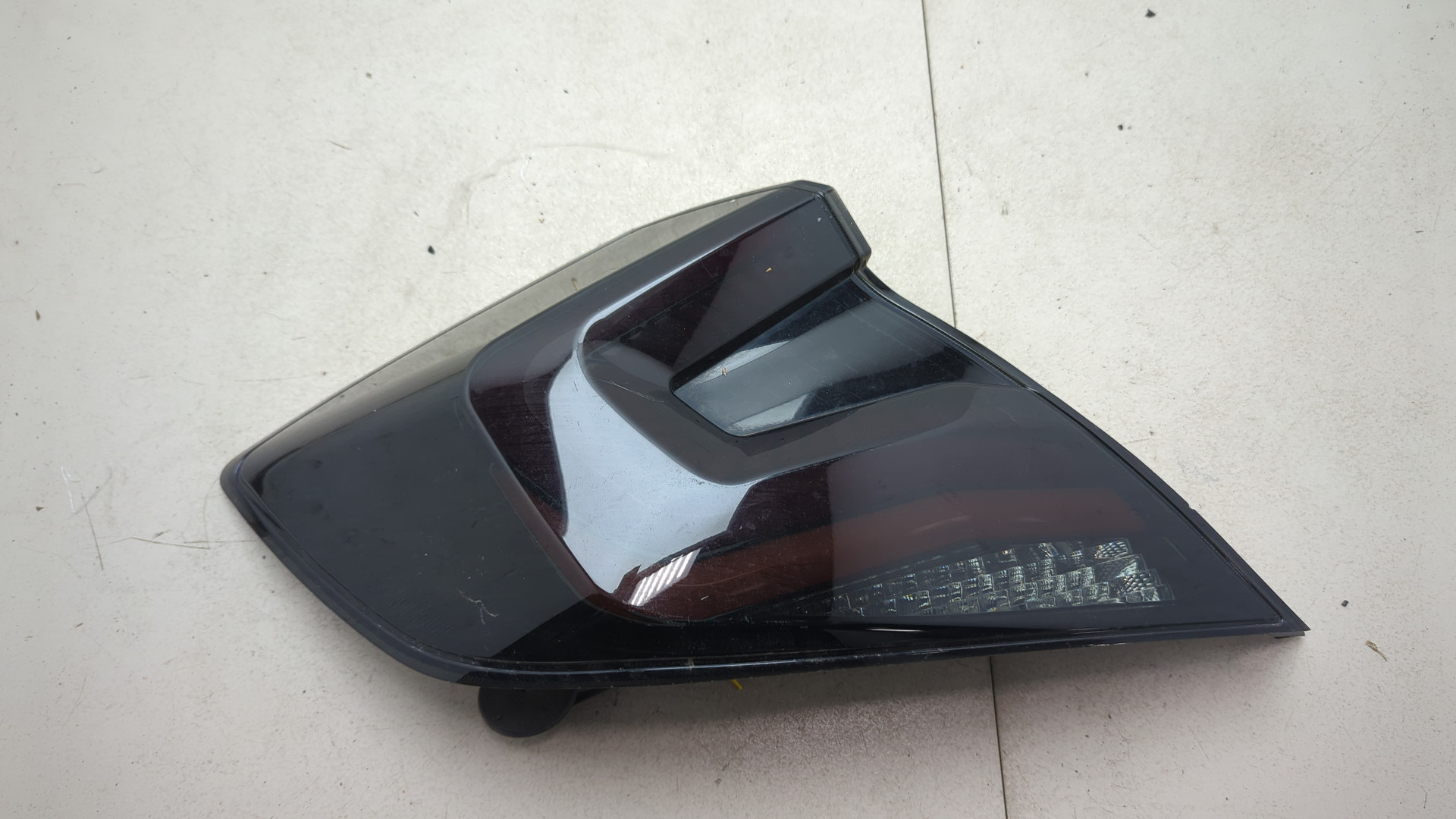 Фонарь задний левый