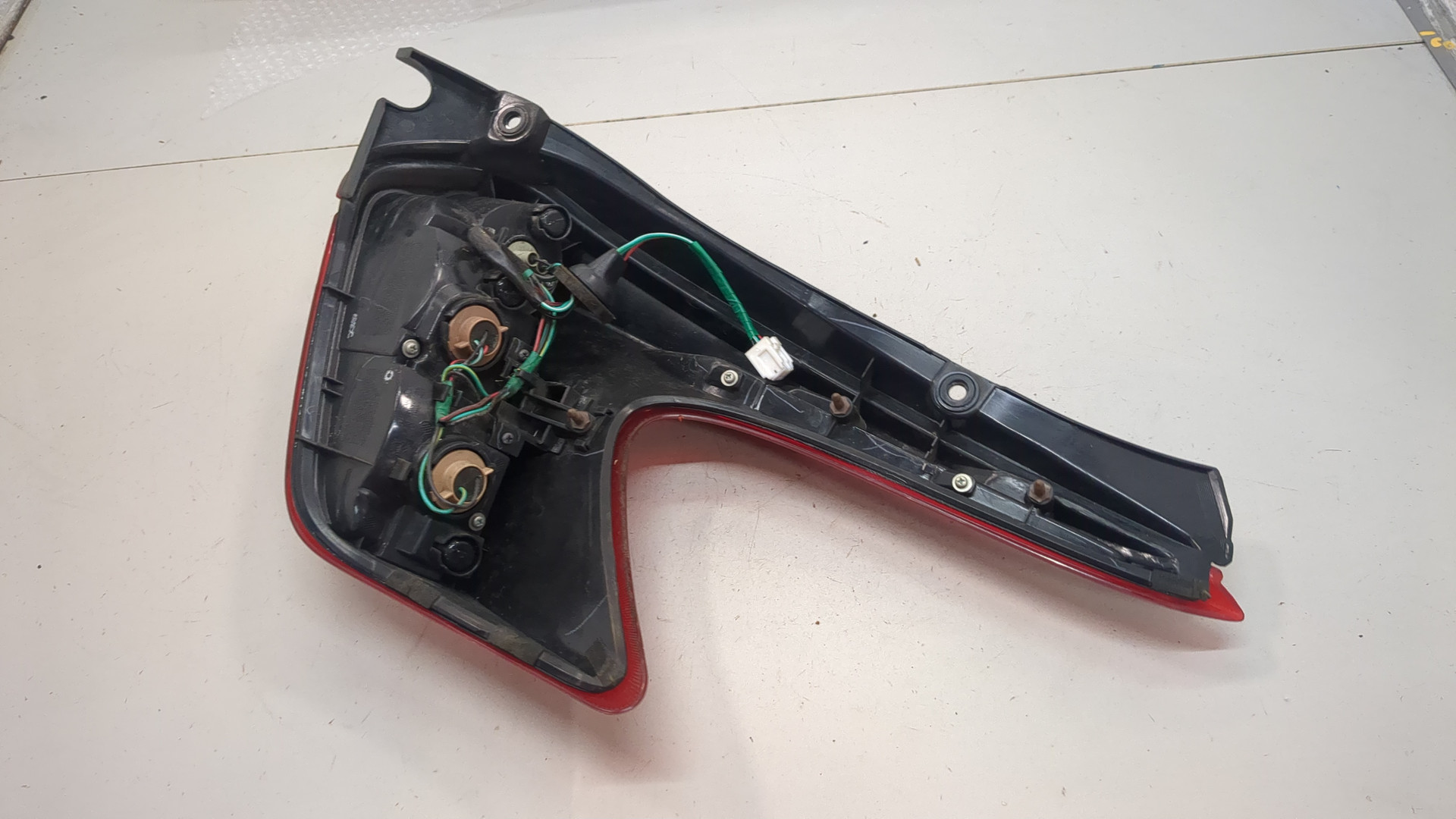 Фонарь задний левый