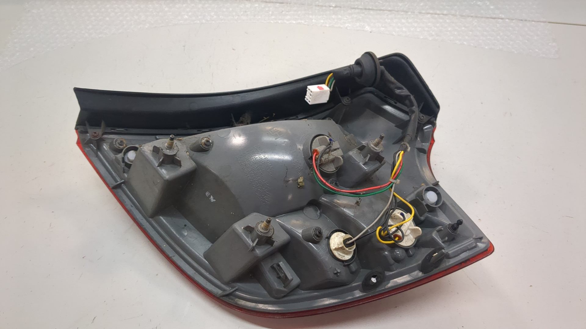 Фонарь задний левый