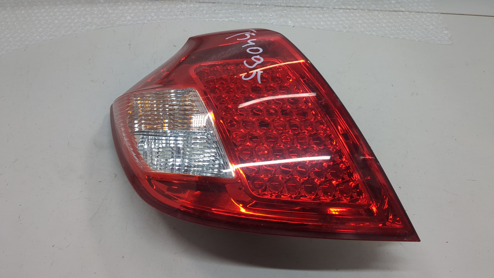 Фонарь задний левый