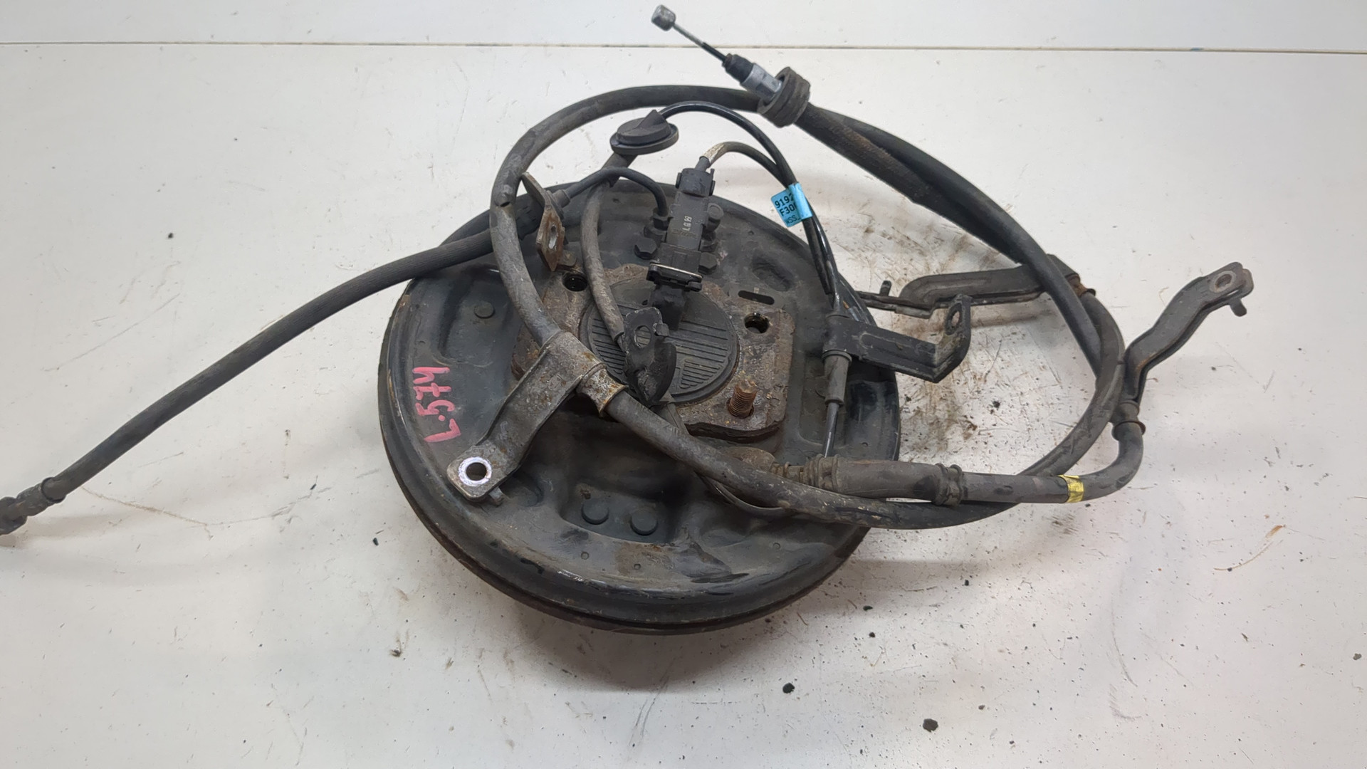 Кулак поворотный задний левый