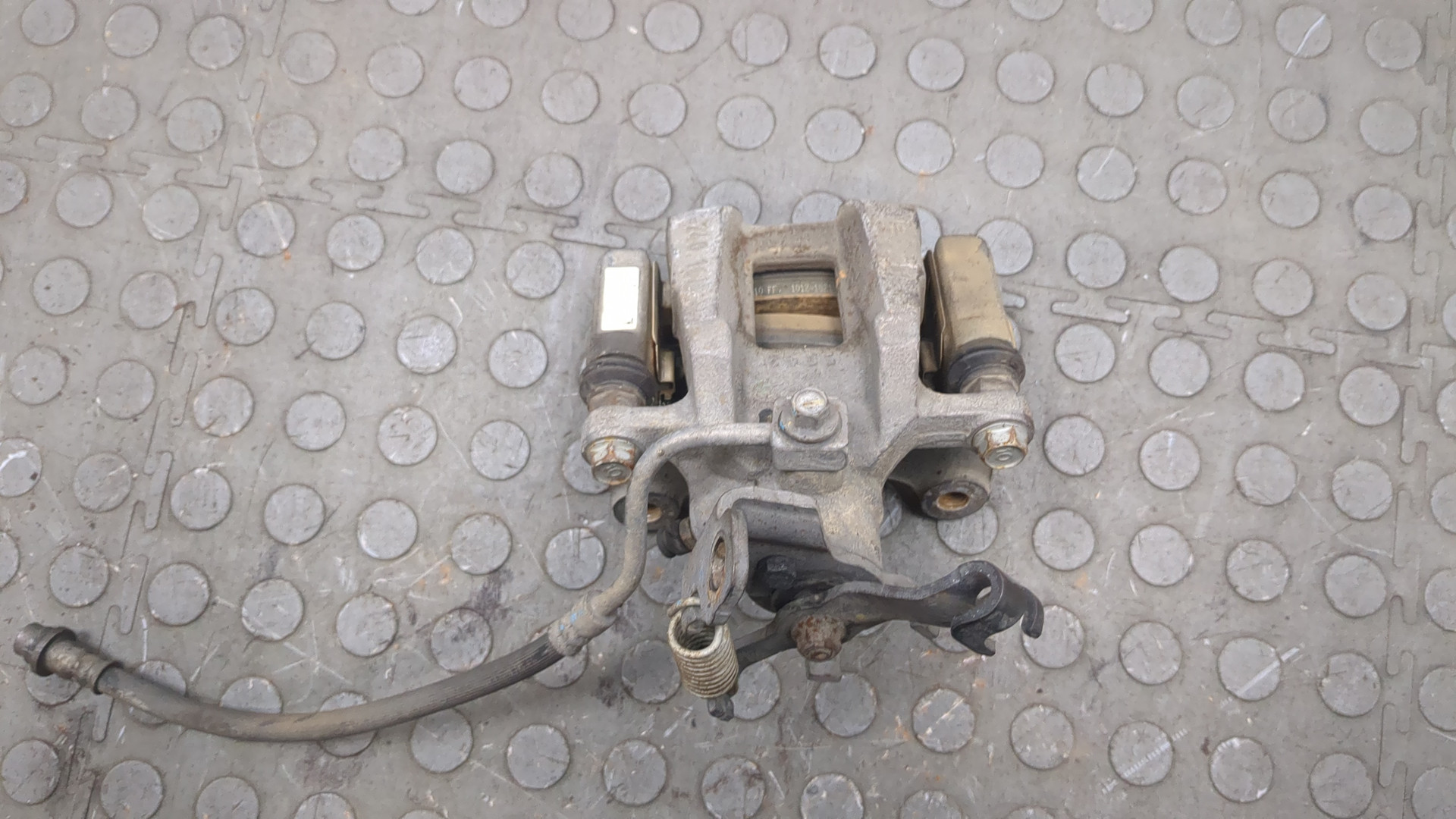 Суппорт задний левый