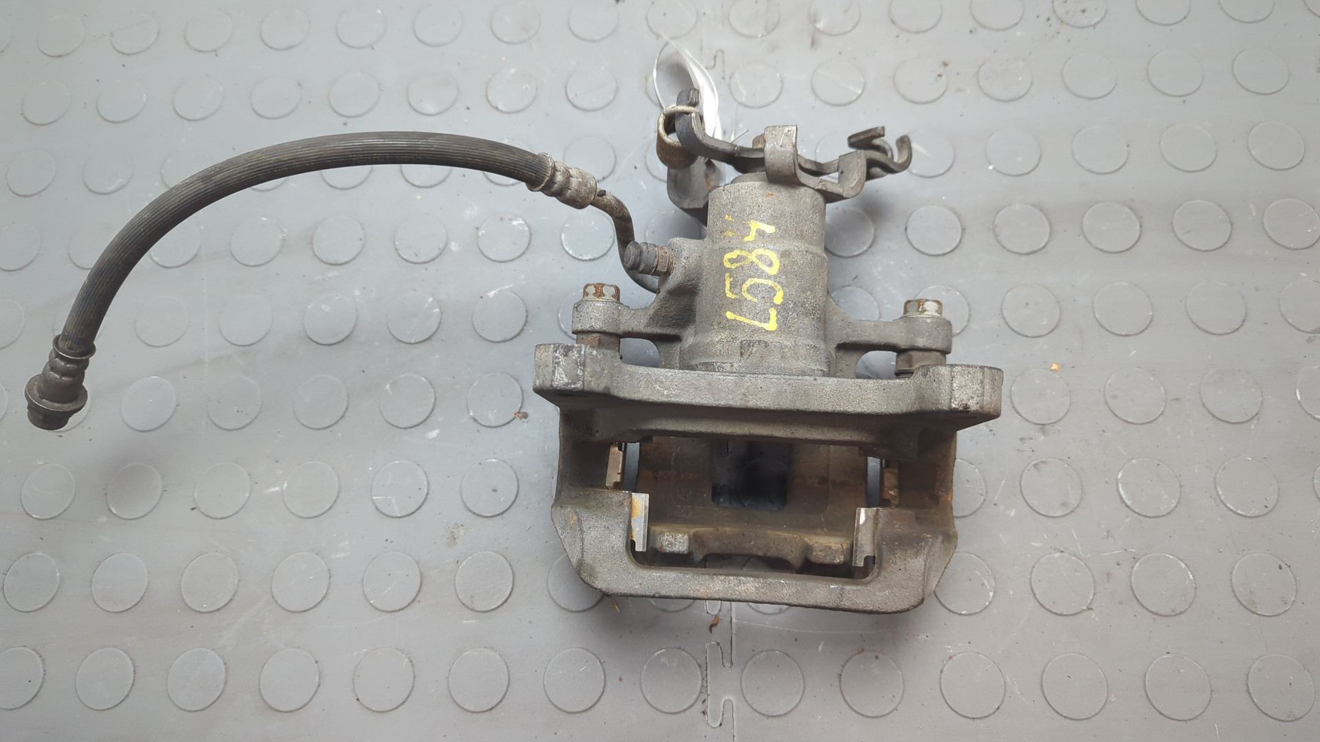 Суппорт задний левый