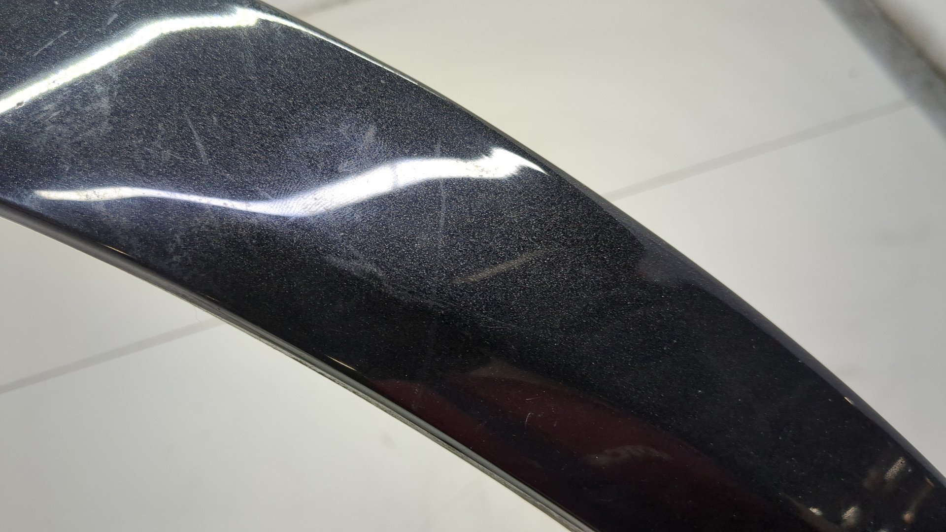 Планка под фару левая