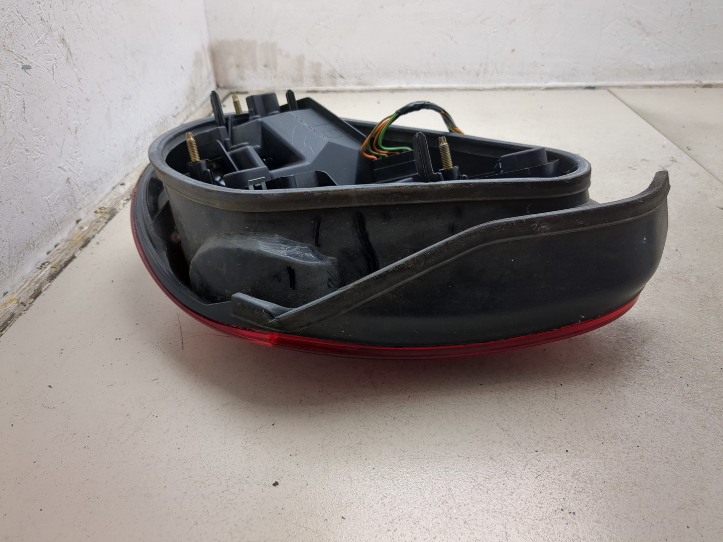 Фонарь задний левый