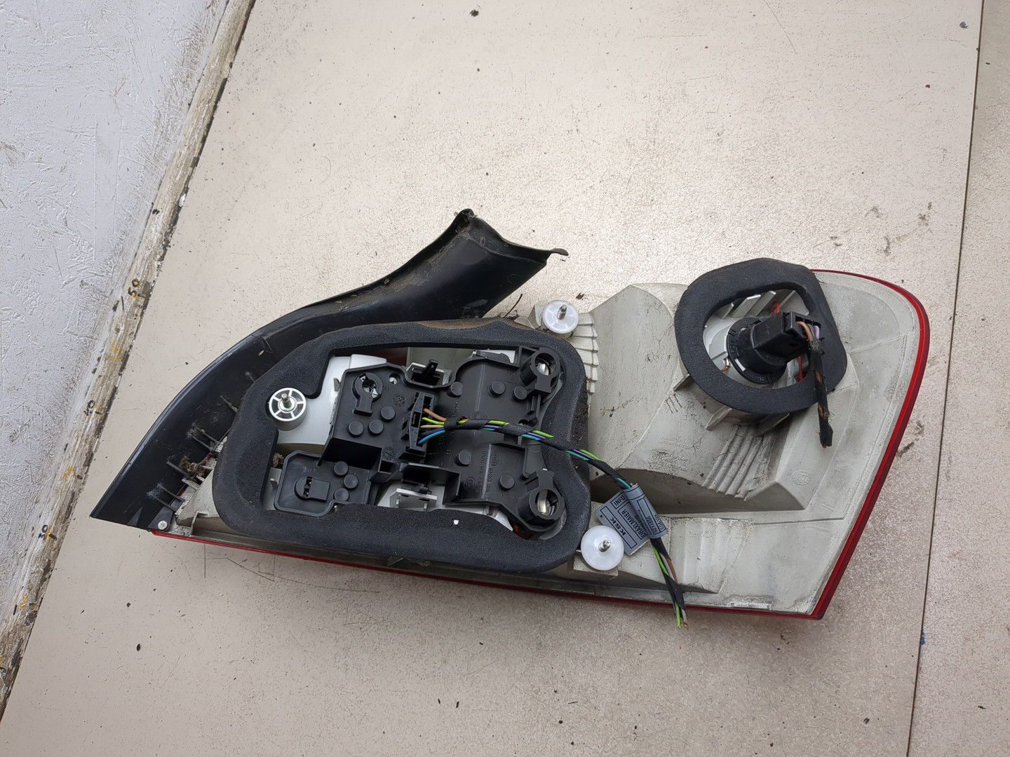 Фонарь задний левый