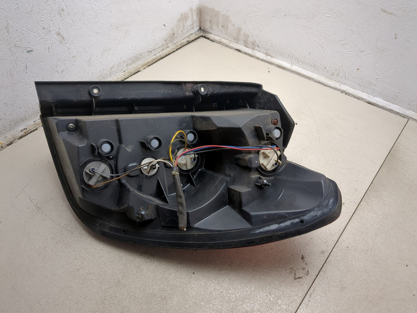 Фонарь задний левый