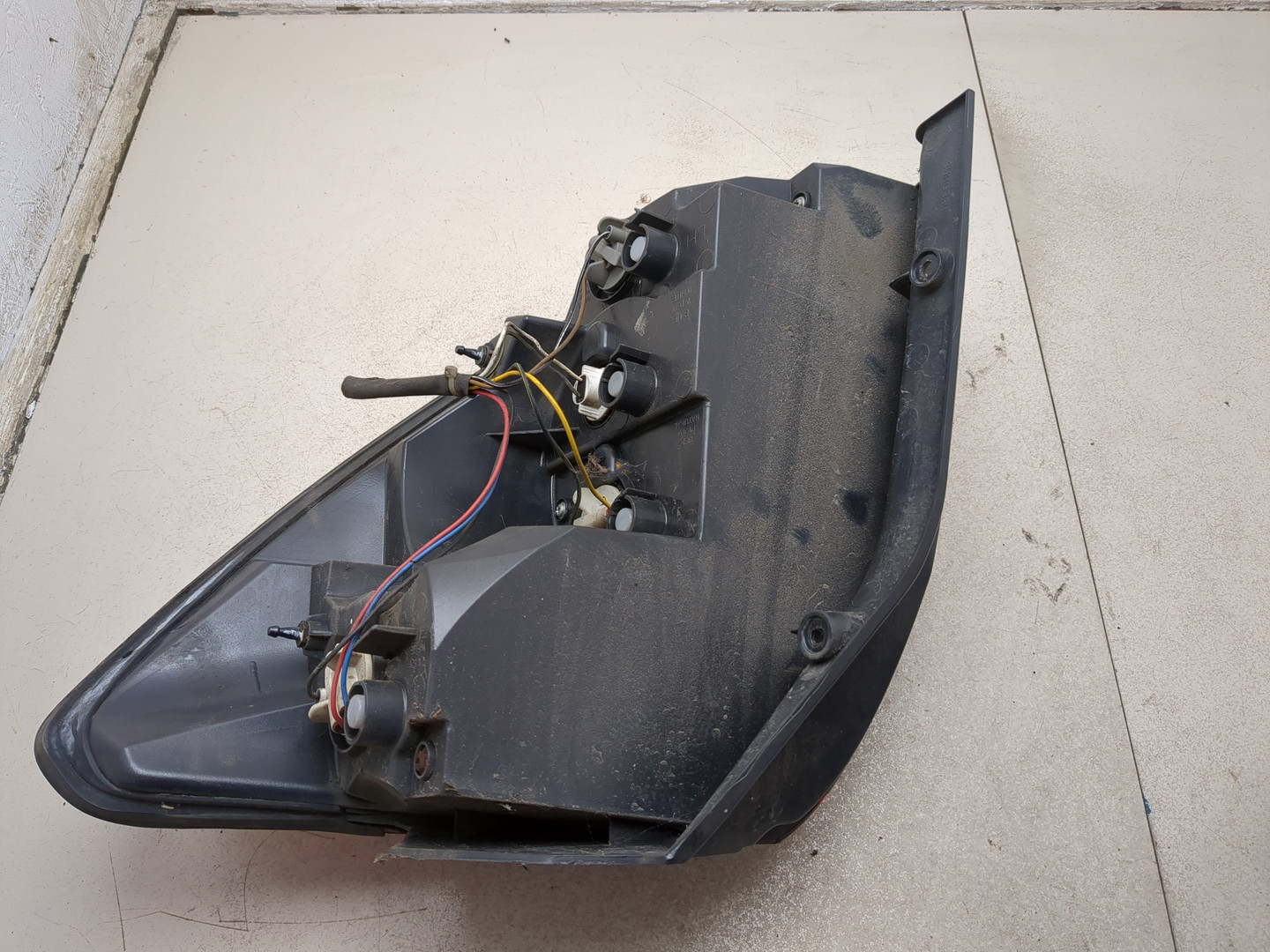 Фонарь задний левый