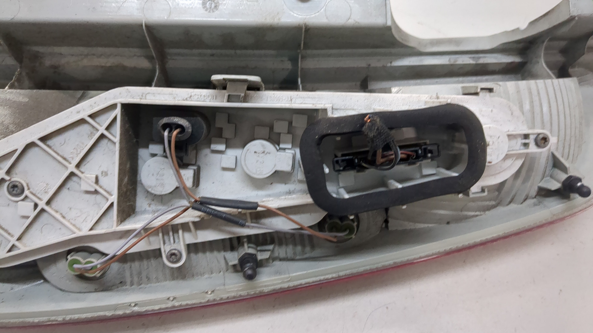 Фонарь задний левый