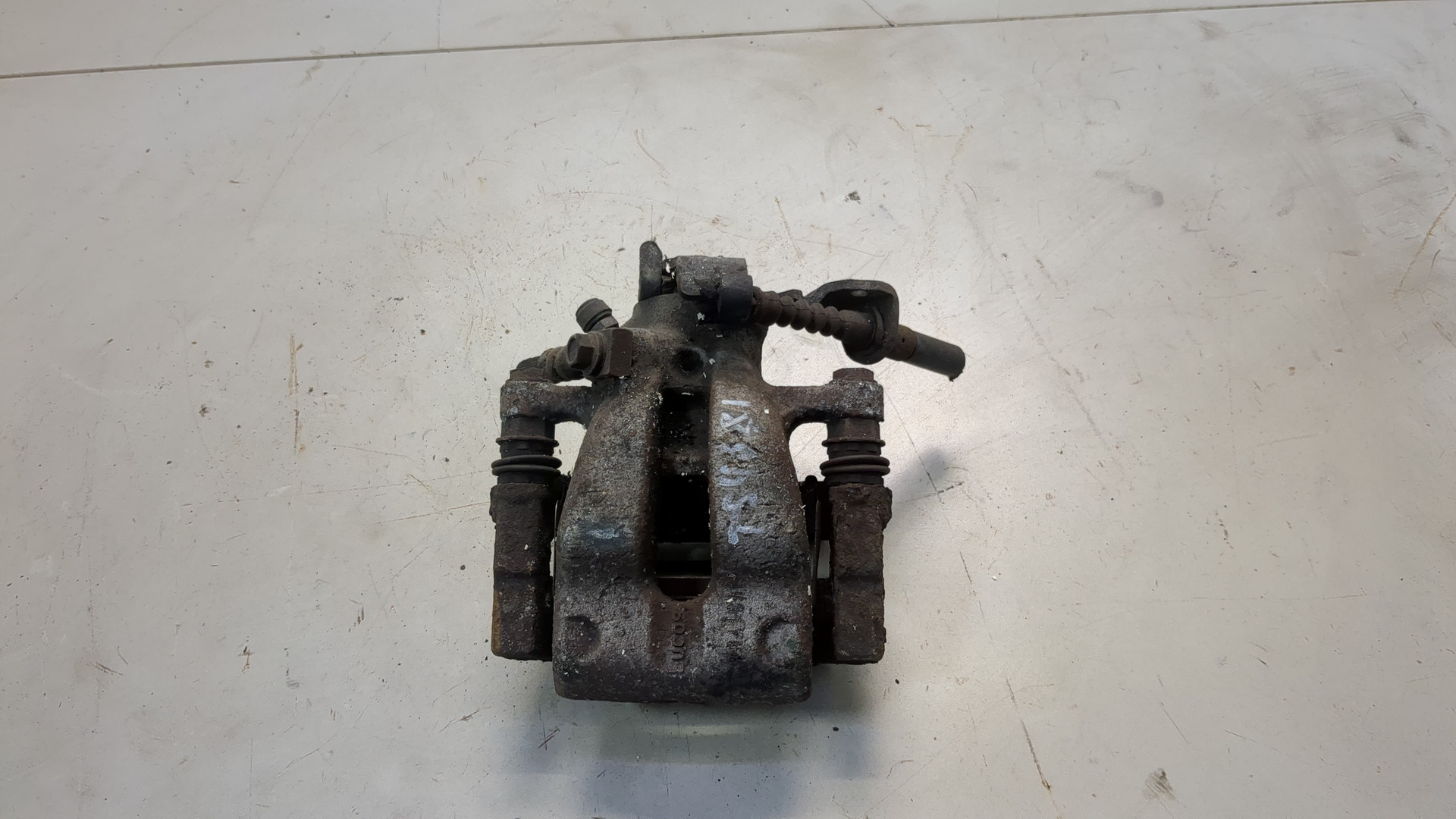 Суппорт задний левый