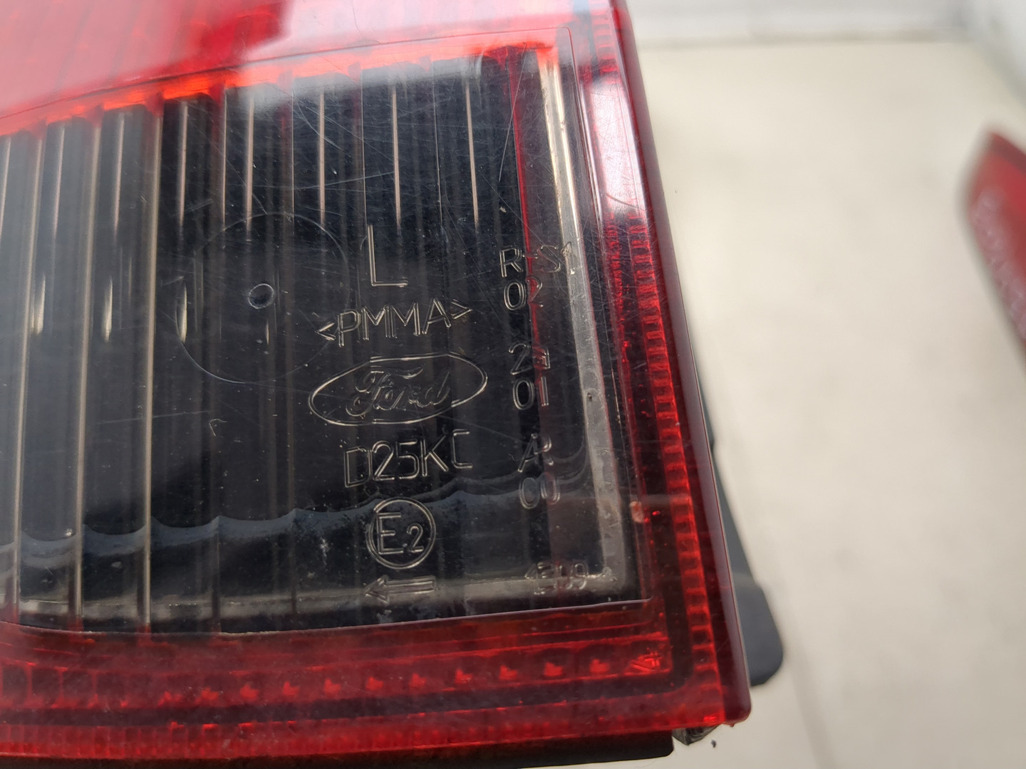 Фонарь задний левый