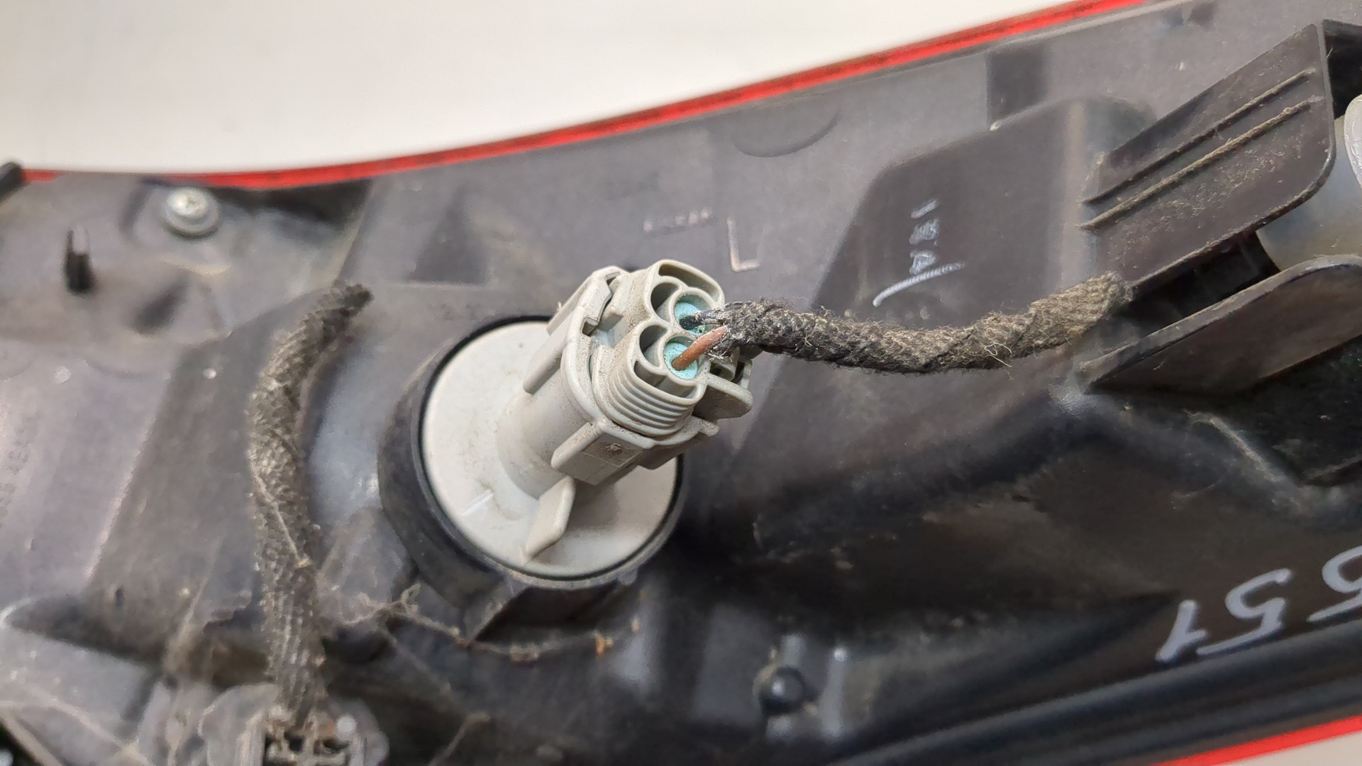 Фонарь задний левый