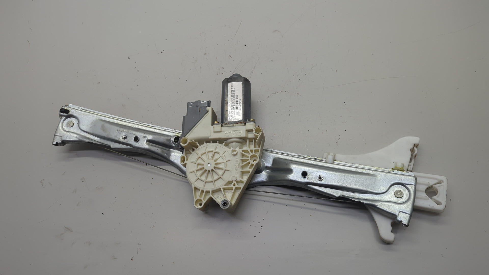 Стеклоподъемник электр. задний левый