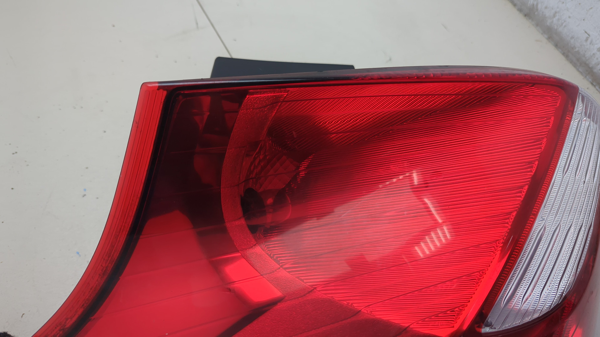 Фонарь задний левый