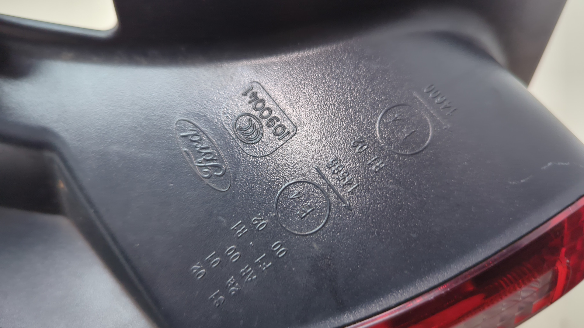 Фонарь задний левый