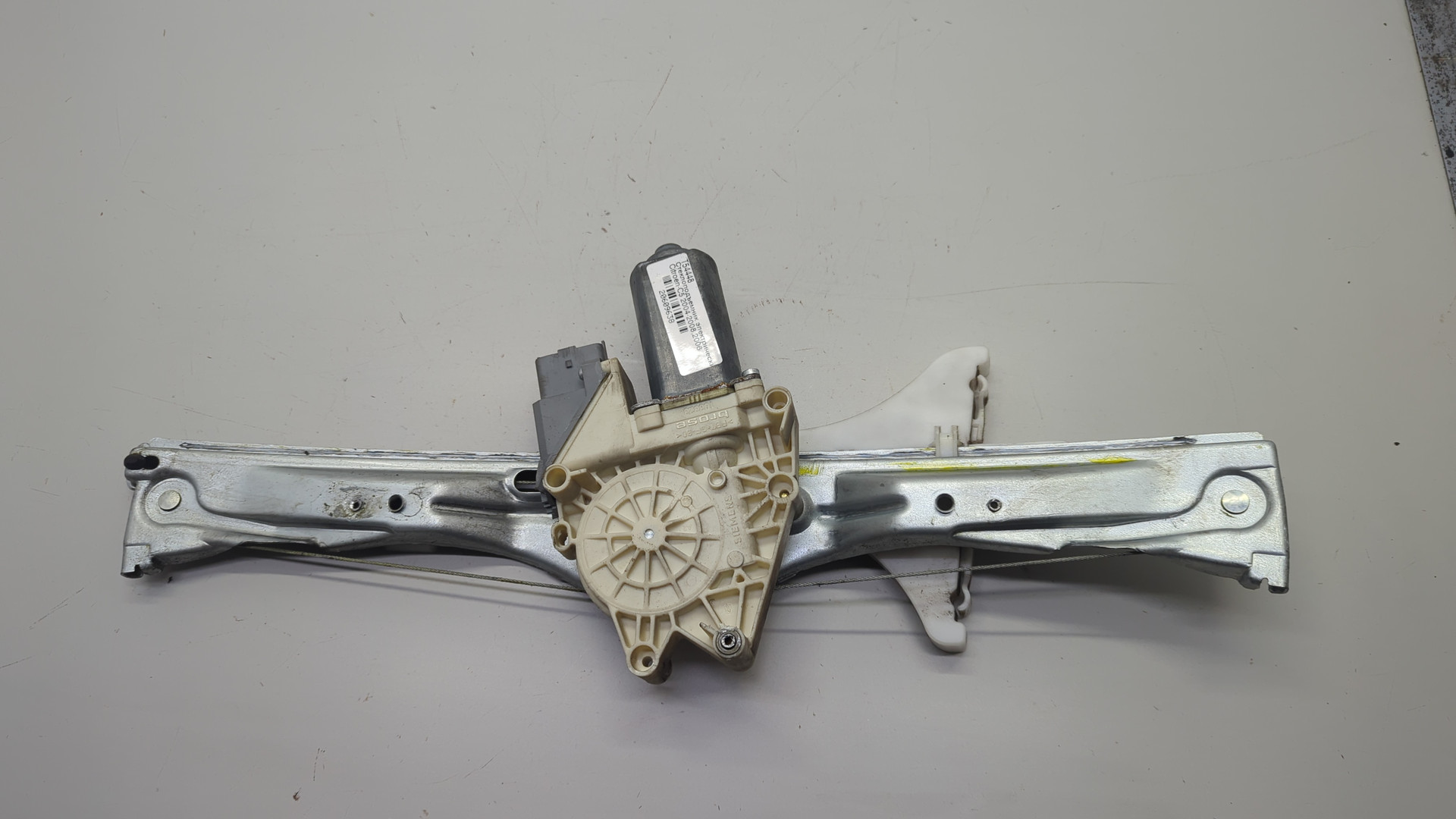 Стеклоподъемник электр. задний левый