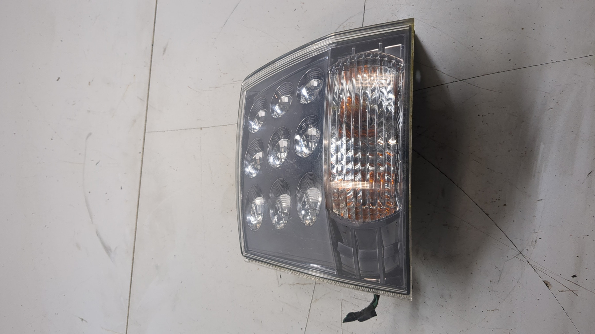 Фонарь задний левый