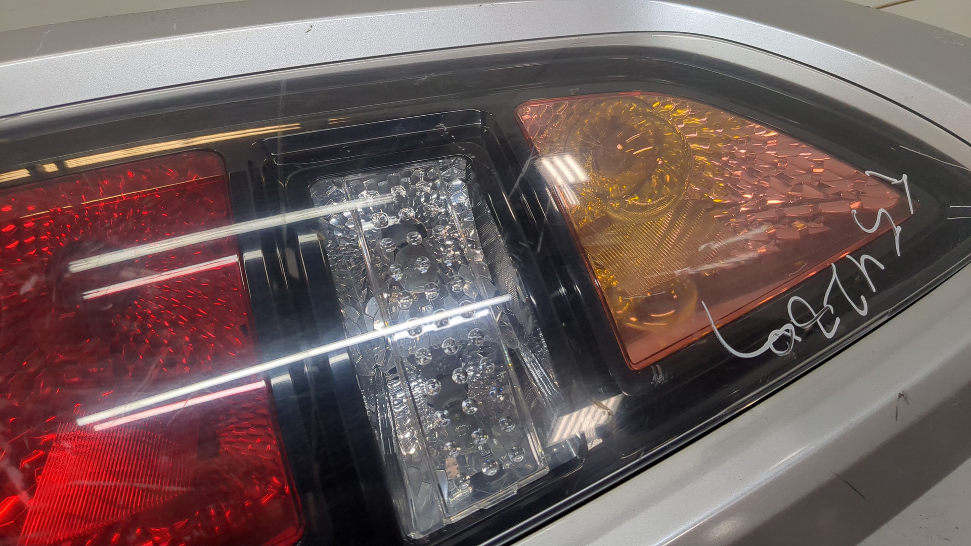 Фонарь задний левый