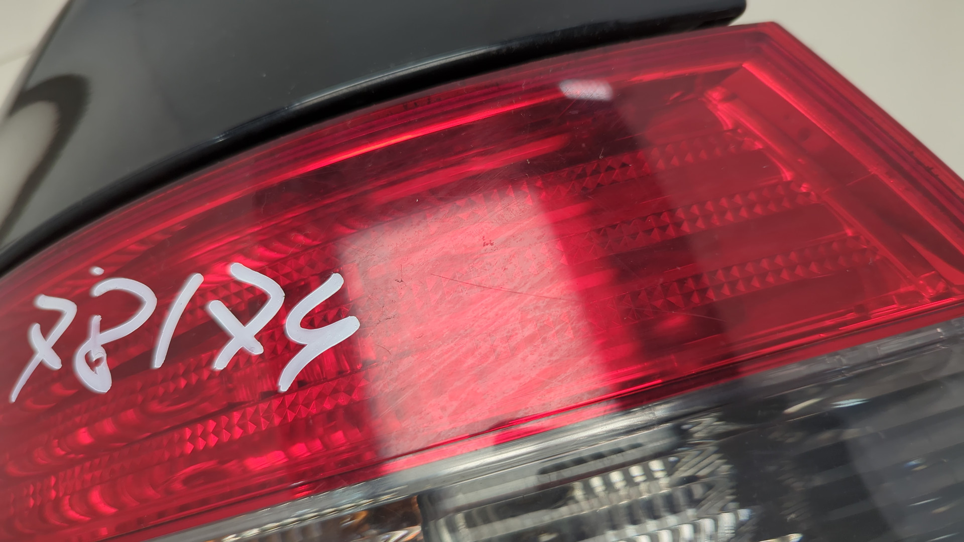 Фонарь задний левый