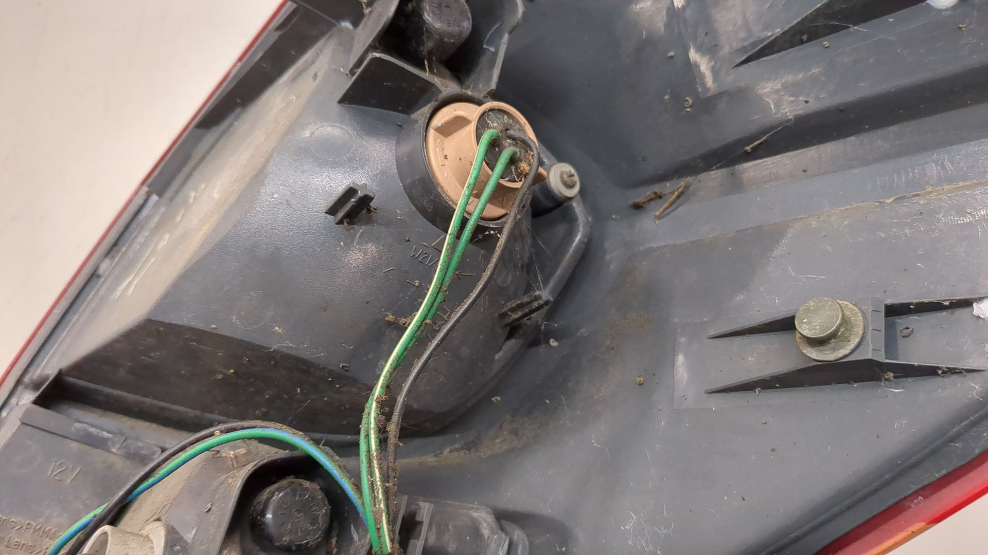 Фонарь задний левый