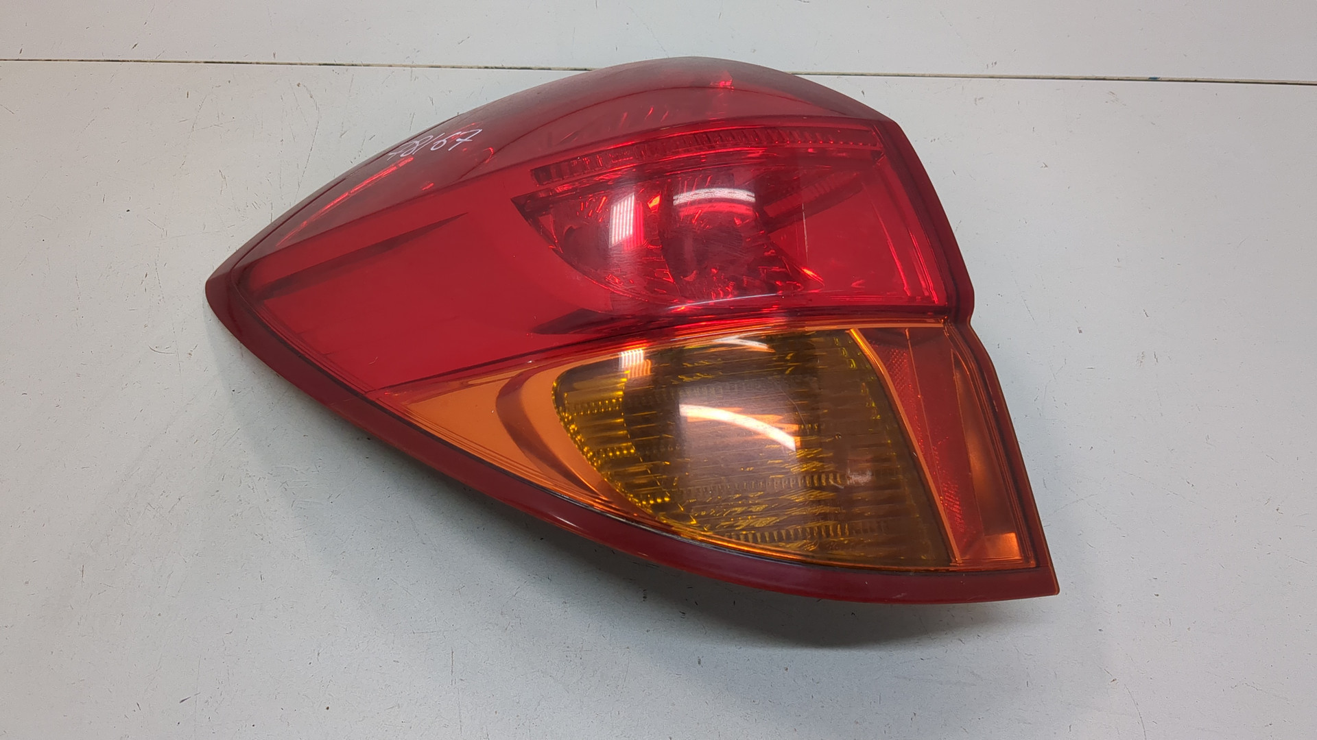 Фонарь задний левый