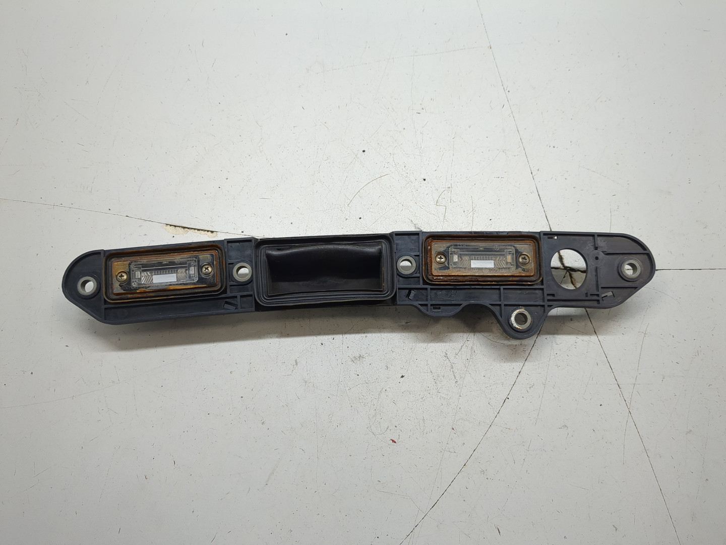 Фонарь подсветки номера