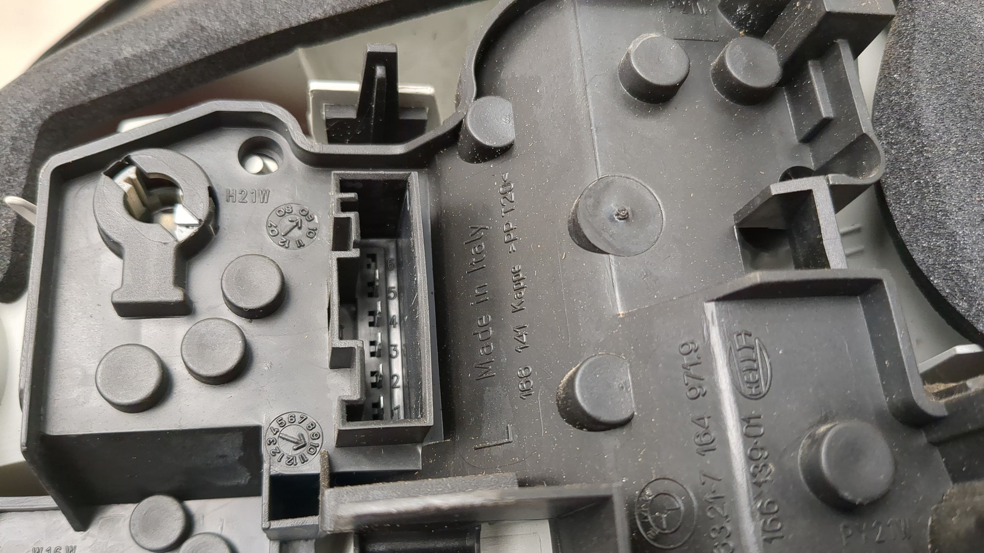 Фонарь задний левый