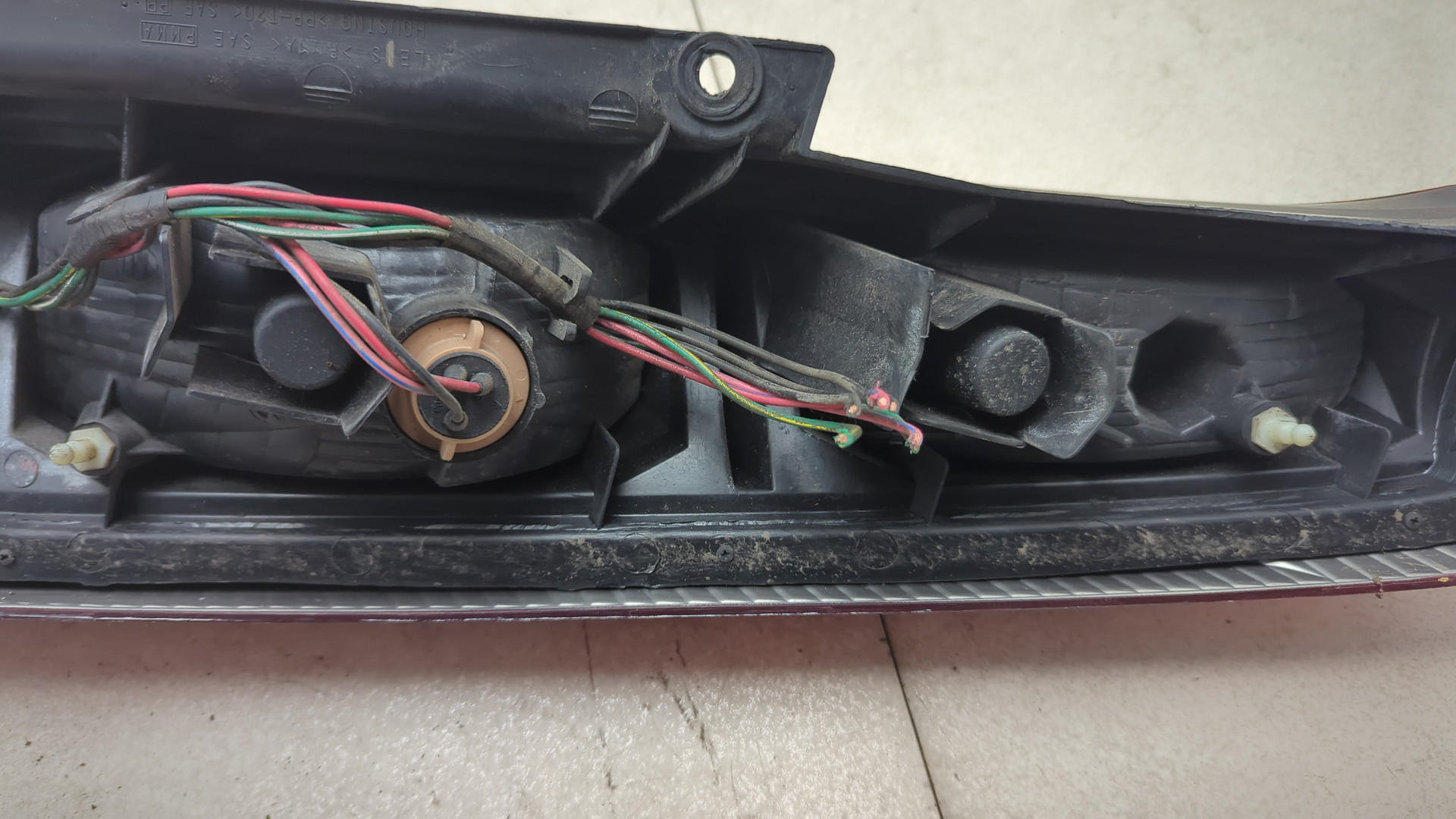 Фонарь задний левый