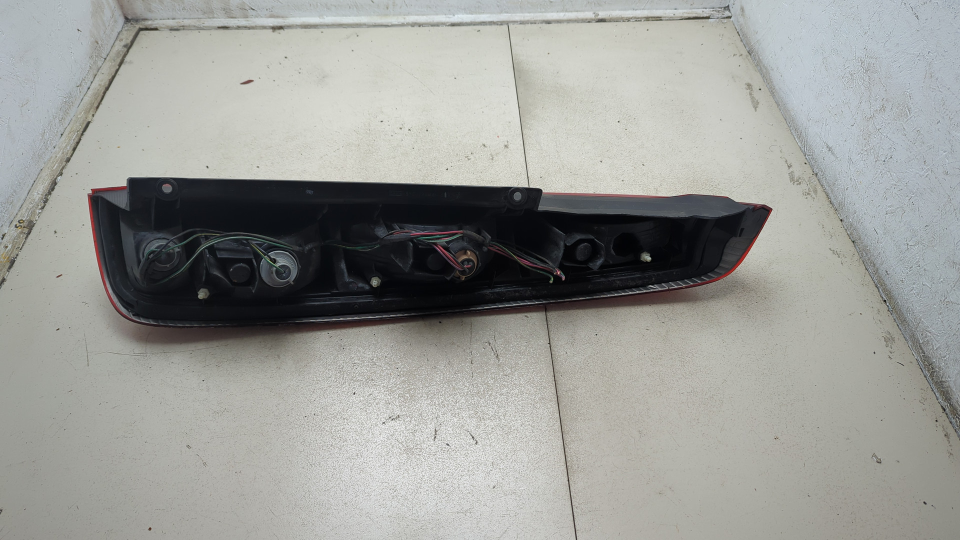 Фонарь задний левый