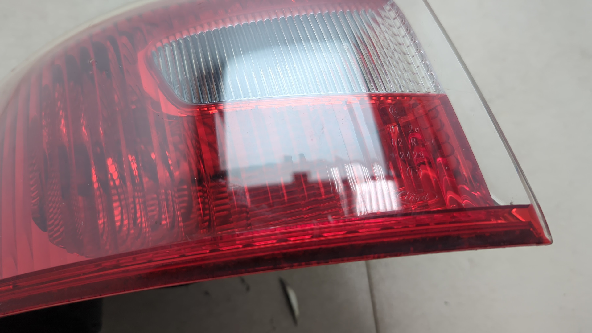 Фонарь задний левый