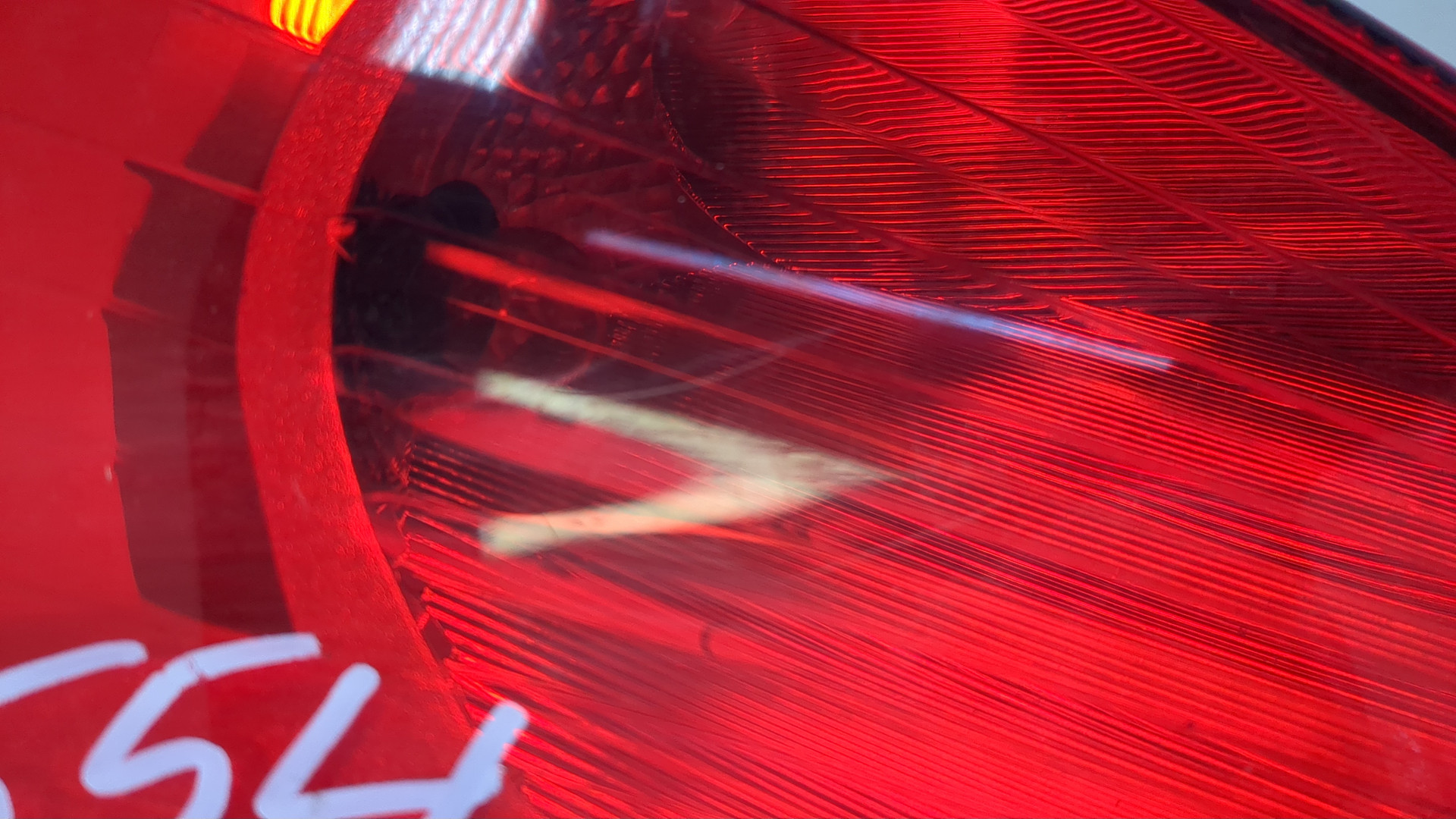 Фонарь задний левый