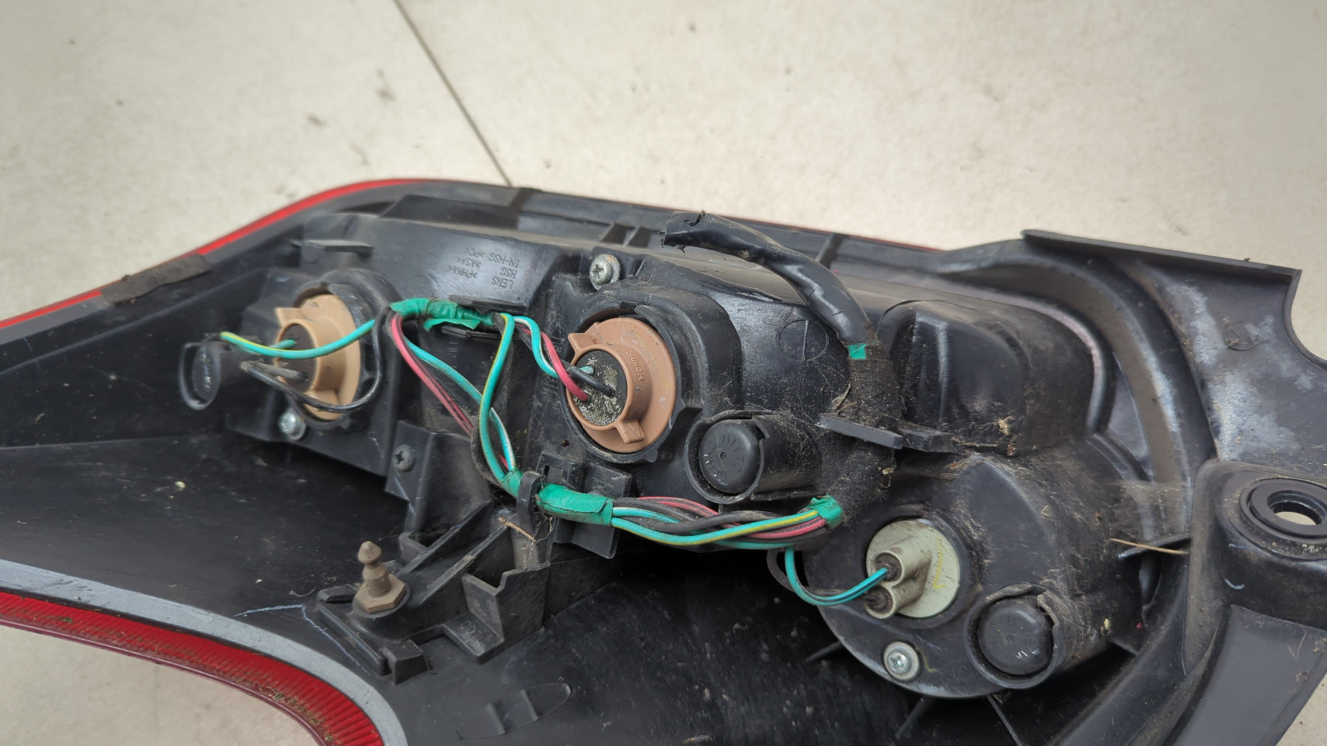 Фонарь задний левый