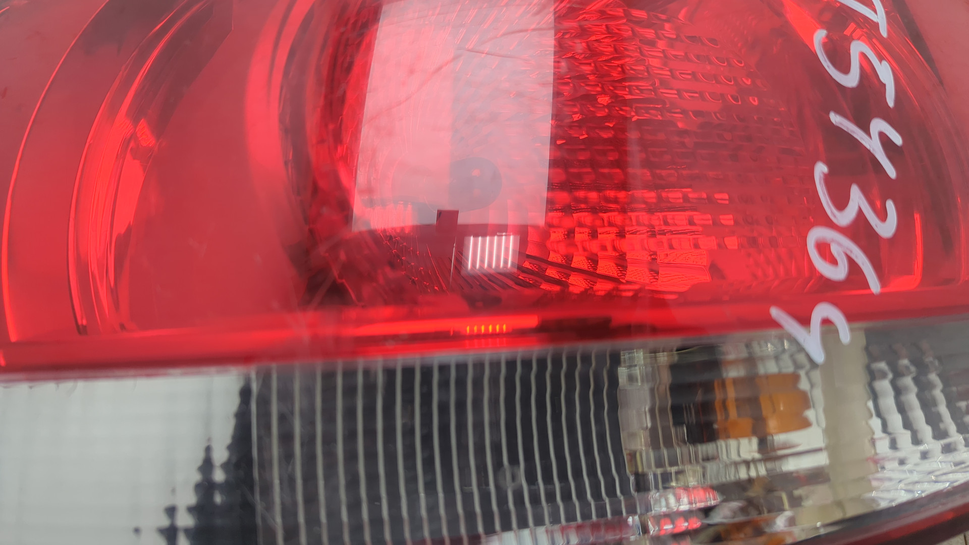 Фонарь задний левый