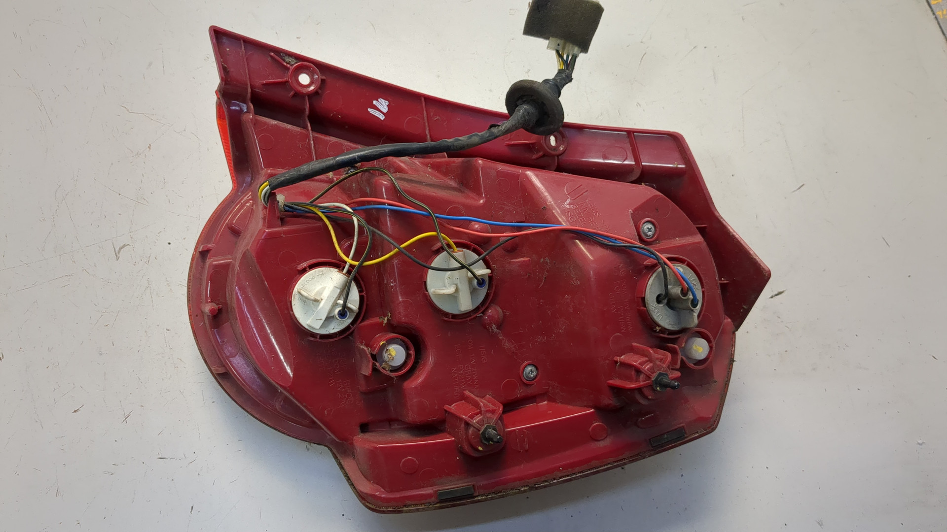 Фонарь задний левый