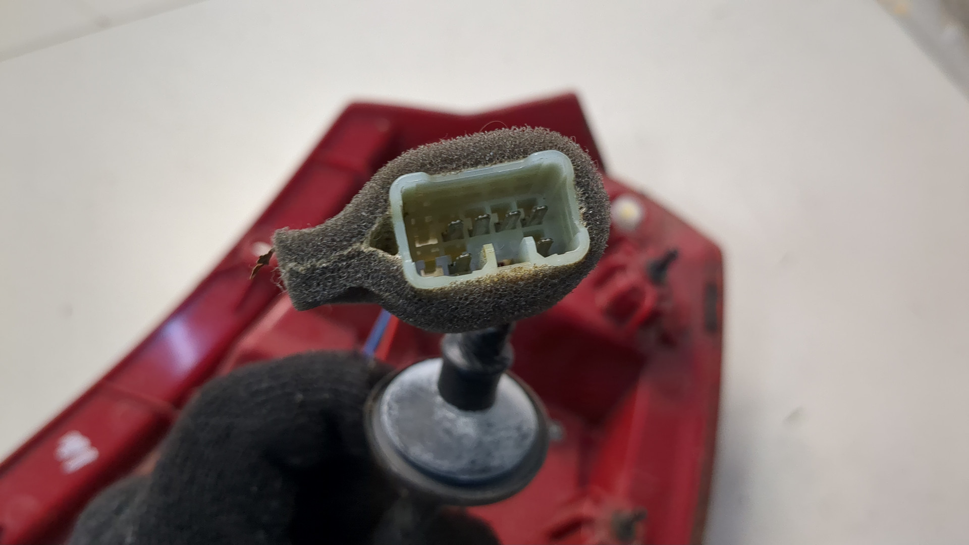 Фонарь задний левый