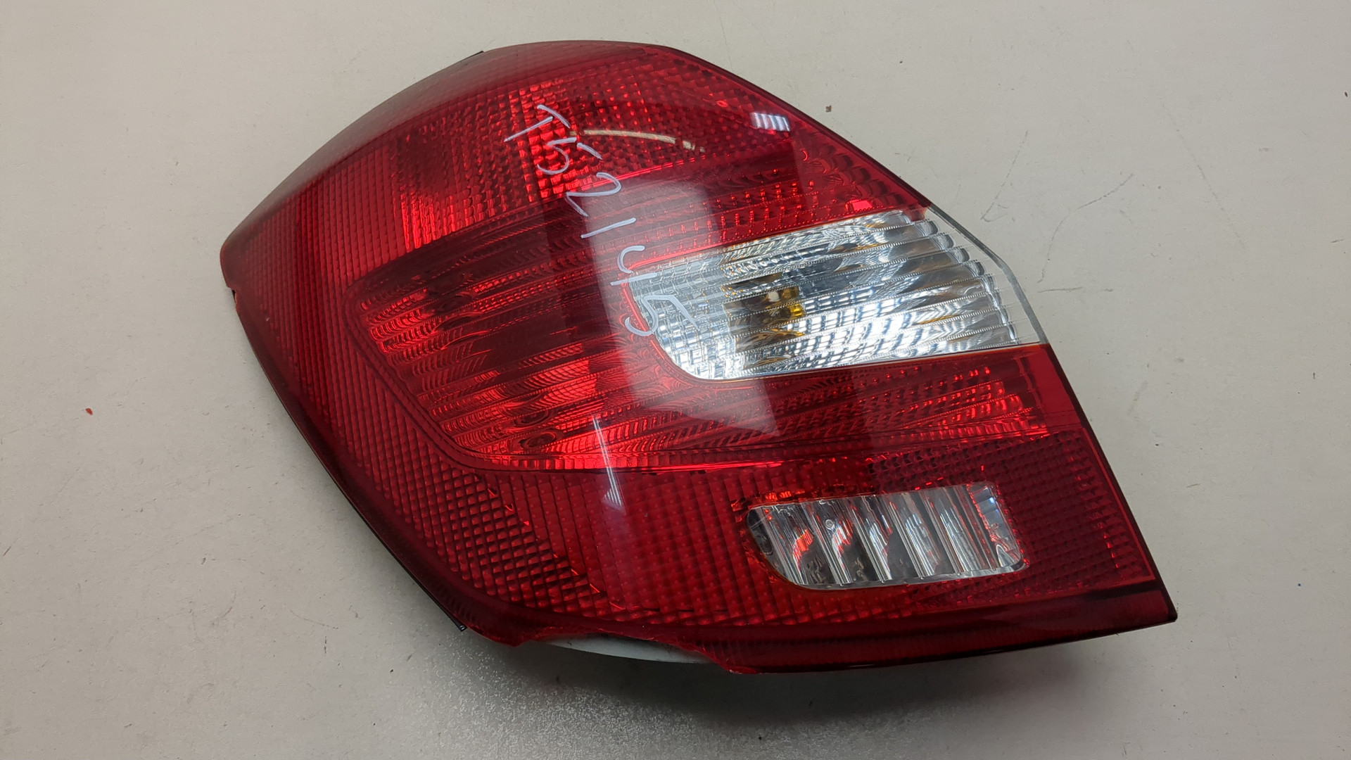 Фонарь задний левый