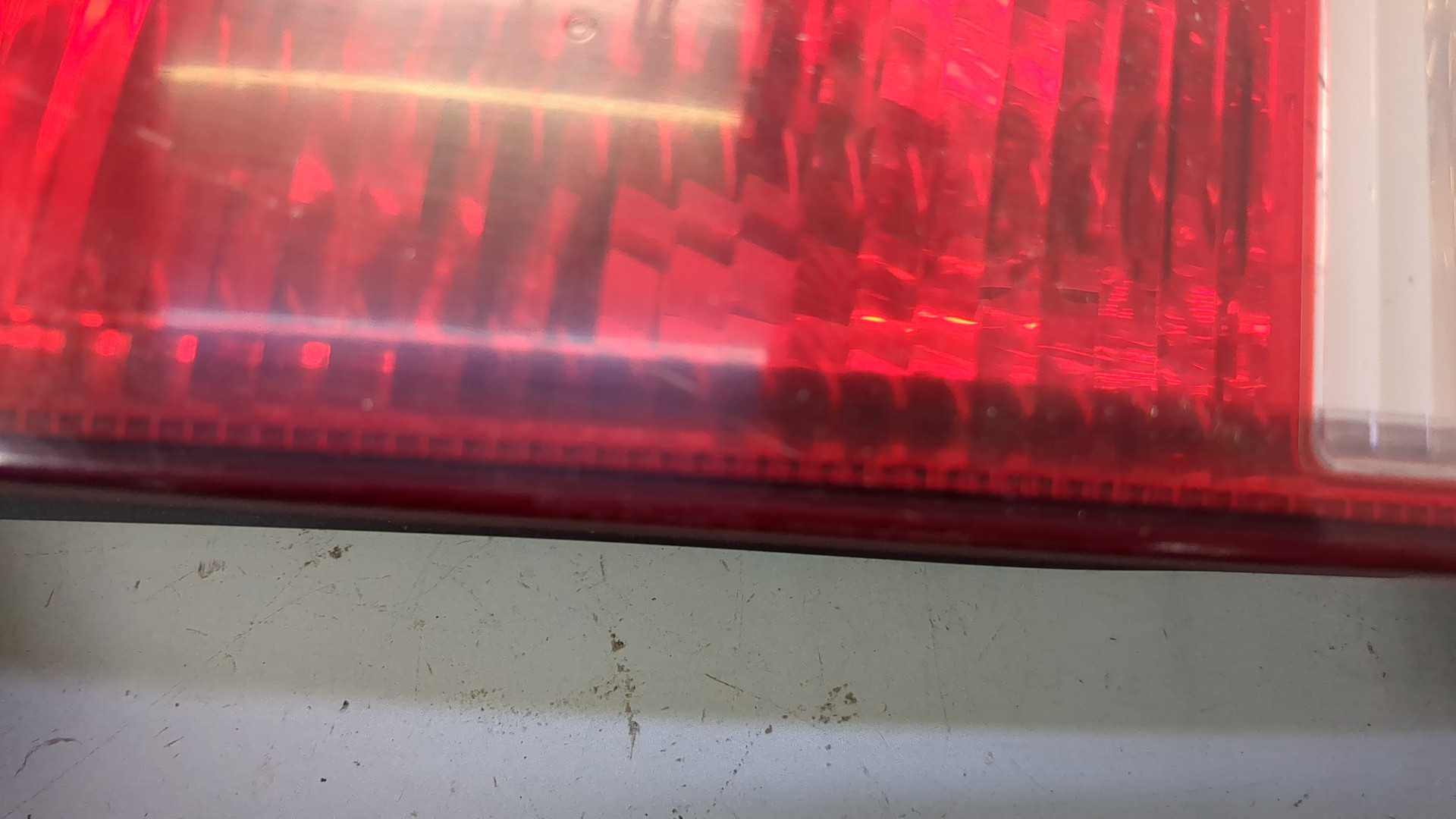 Фонарь задний левый