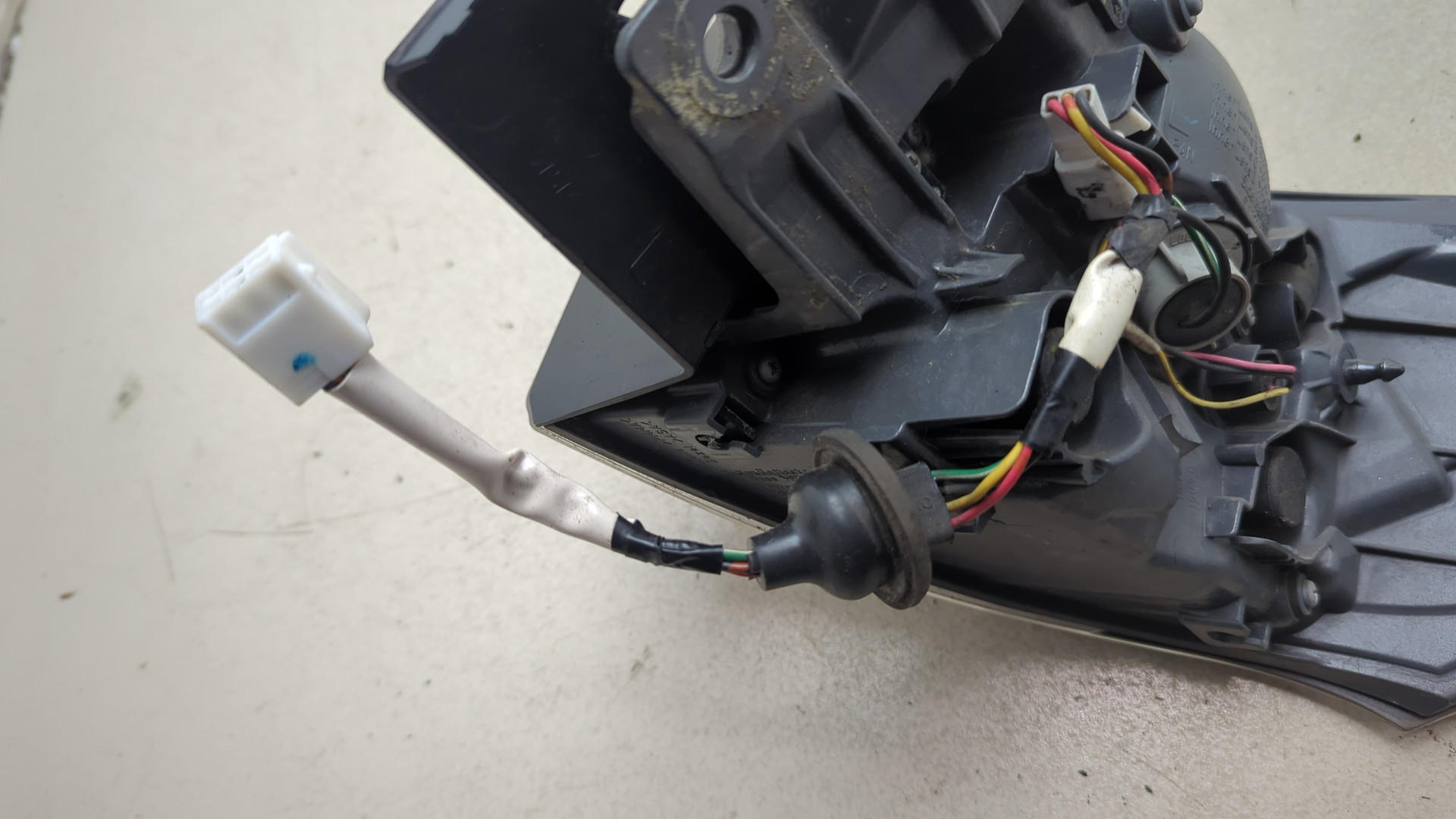 Фонарь задний левый